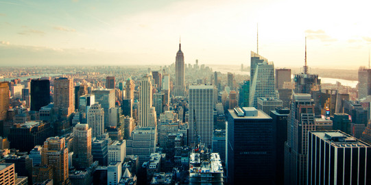 Panoramic view of Manhattan's skyscrapers at dusk